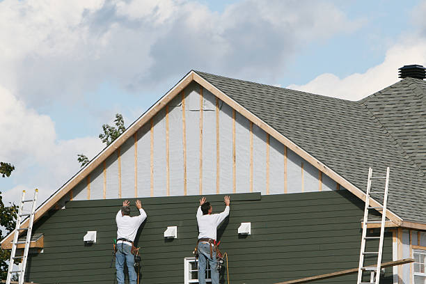 Professional Siding technician working in Owensville, OH